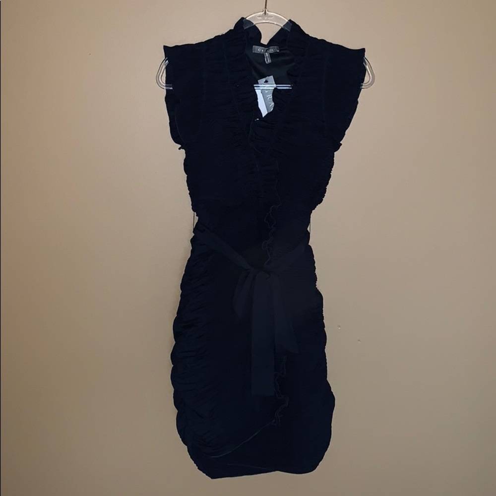 Elegant navy blue ruffled dress.